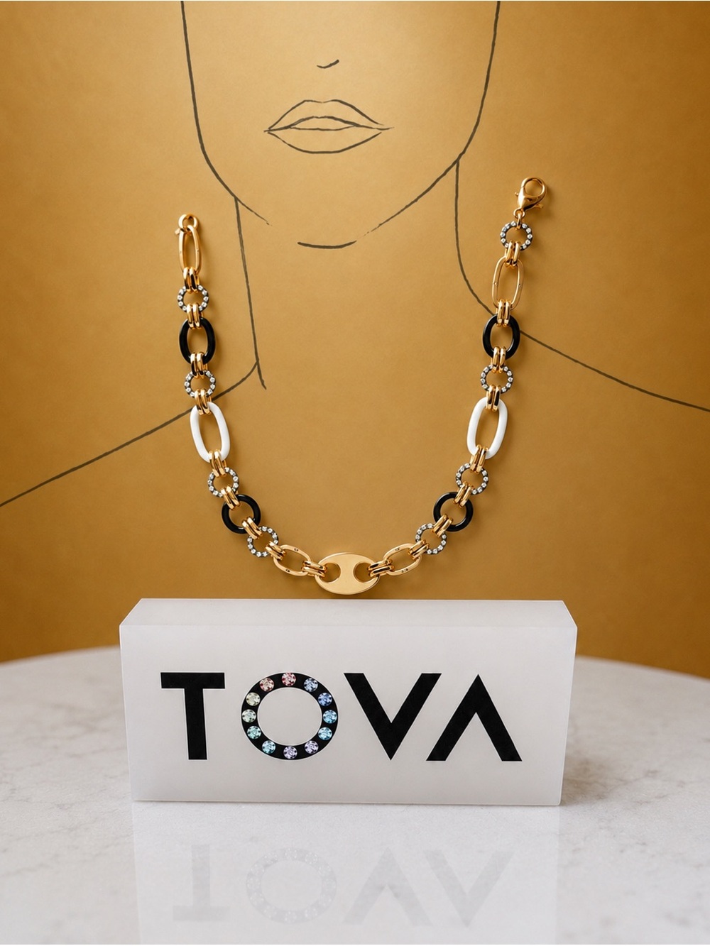 TOVA Reno Necklace 
White and black enamel with crystal accents.